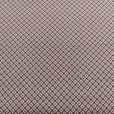 Tecido com padrão de pequenos losangos vermelhos e azuis sobre fundo branco