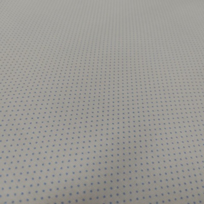 Tecido branco com pequenos pontos azuis padrão