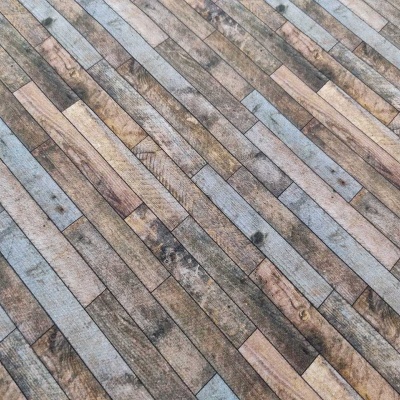 Painel decorativo com padrão de tábuas de madeira em vários tons e texturas envelhecidas.