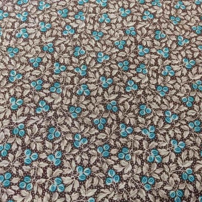 Tecido com padrão floral em azul-turquesa e castanho sobre fundo bege
