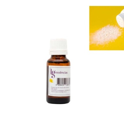 Frasco de essência em vidro castanho com tampa branca e tubo branco com pó derramado