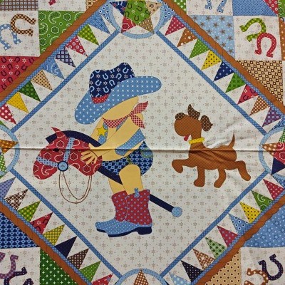 Padrão de colcha infantil com vaqueiro, cão e ferraduras coloridas