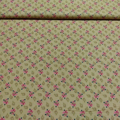 Rolo de tecido bege com padrão floral pequeno