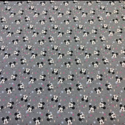 tecido com padrão repetido de Mickey Mouse em fundo cinza com estrelas