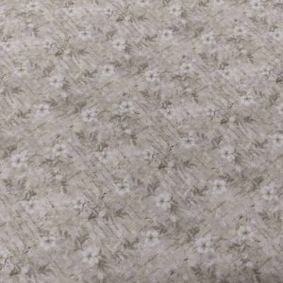 tecido bege com padrão floral branco e castanho claro