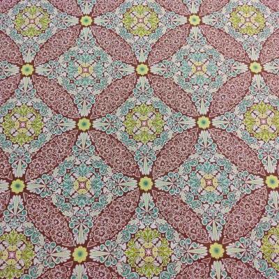 Tecido com padrão geométrico colorido em losangos