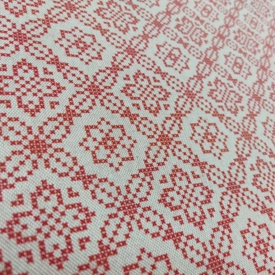 Tecido com padrão geométrico vermelho e branco