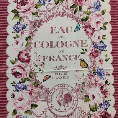 Tecido decorativo com padrão floral e texto em francês