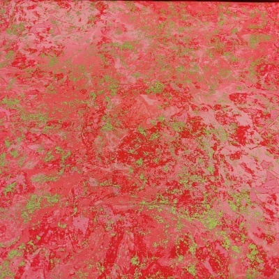 Superfície vermelha com padrão verde e textura abstrata