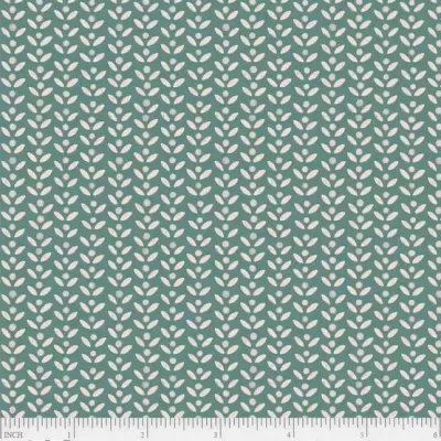 tecido verde-azulado com padrão de folhas brancas e régua de medição