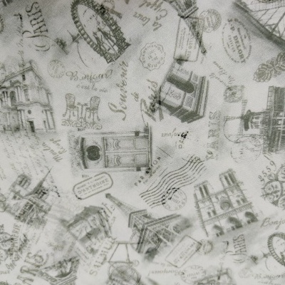 Tecido estampado com motivos arquitetónicos e textos em cinza e preto