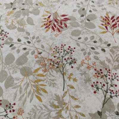 Tecido com padrão floral colorido em fundo claro