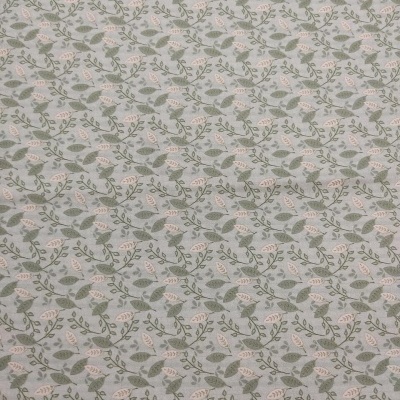Tecido bege claro com padrão de folhas verdes e bege