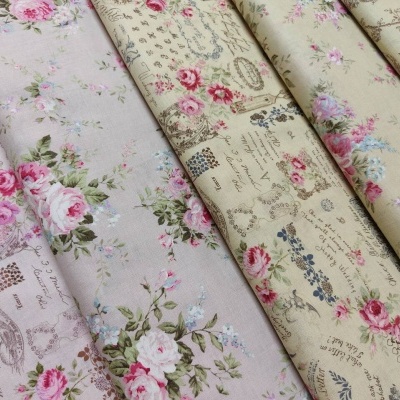 tecidos florais vintage em tons pastel enrolados lado a lado