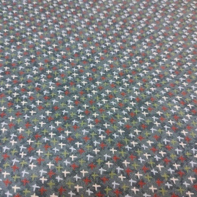 Tecido cinza com padrão de pequenos sinais de mais coloridos