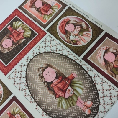 tecido estampado com ilustrações de bonecas em padrões variados