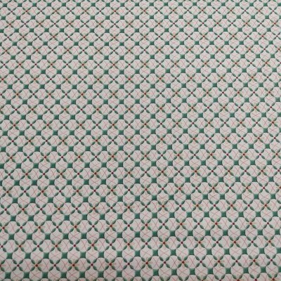 Tecido branco com padrão geométrico verde