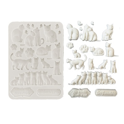 Molde de silicone branco e peças brancas de gatos e pegadas