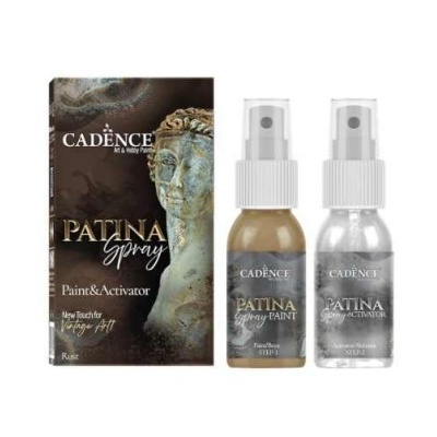 Conjunto Cadence Patina Spray com sprays dourado e prata e embalagem preta com escultura e texto.