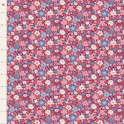 tecido floral colorido com fundo vinho e régua de medição ao lado