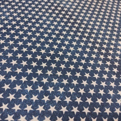 tecido azul com padrão de estrelas brancas