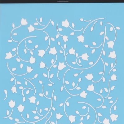 Stencil com padrão floral branco em fundo azul, embalagem preta com texto
