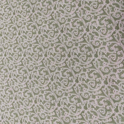 Pano com padrão de arabescos brancos sobre fundo verde