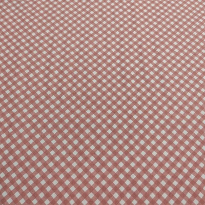 Tecido com padrão vichy rosa e branco e textura visível