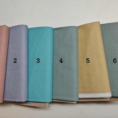 Sete tecidos coloridos numerados de 1 a 7 alinhados lado a lado