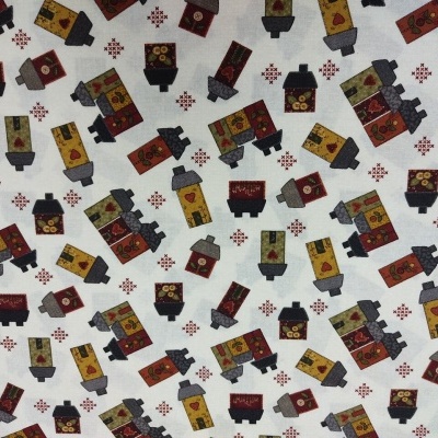 Tecido branco com padrão de casas geométricas coloridas.