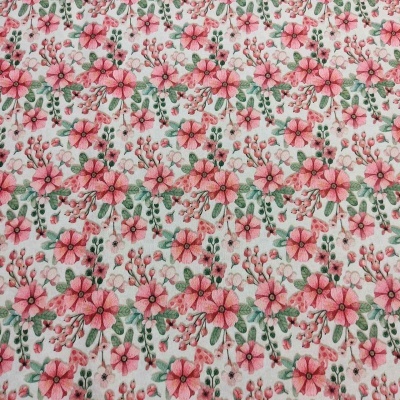 tecido com padrão floral cor-de-rosa e verde em fundo branco