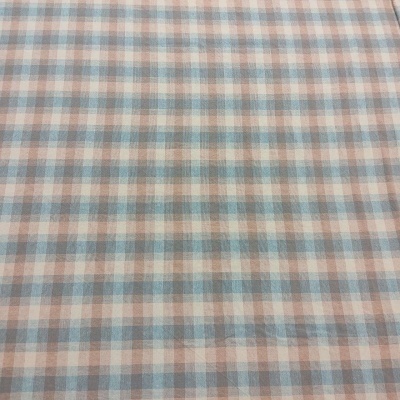 Tecido xadrez azul claro, bege e branco
