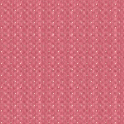 Tecido cor-de-rosa com pequenos pontos brancos