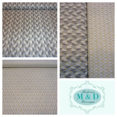 tecido com padrão geométrico em cinza, azul, branco e dourado e logótipo Madeiras M & D Decoração