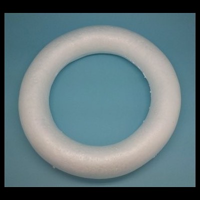 Anel circular branco de esferovite sobre fundo azul