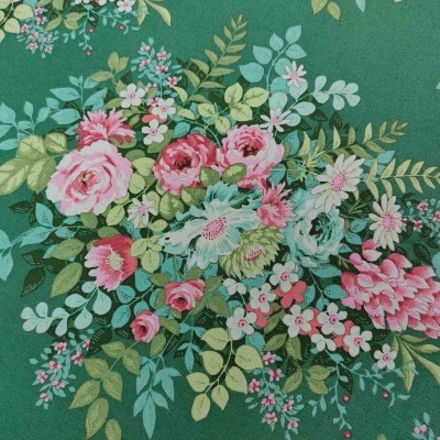 Tecido verde com padrão floral colorido