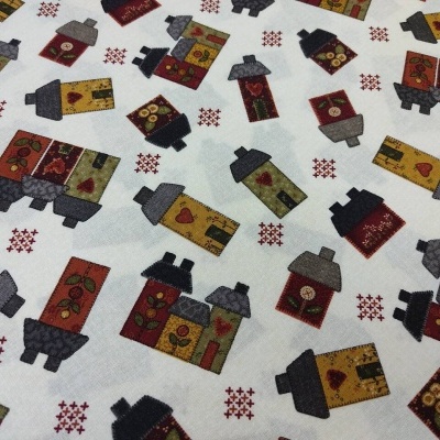 Tecido branco com padrão de casas estilizadas em vermelho, amarelo, cinza e preto