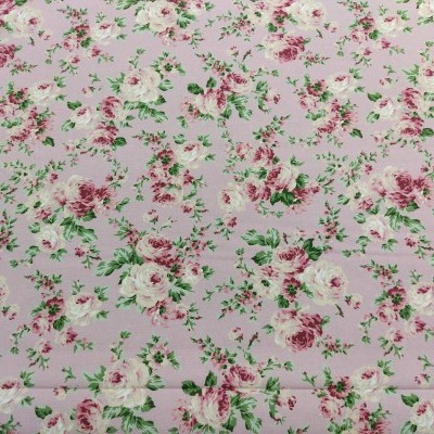 Tecido floral lilás com flores rosa, branco e verde