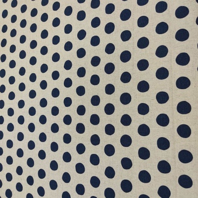Tecido bege com padrão de bolinhas azuis