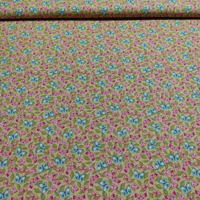 Rolo de tecido floral amarelo com flores azuis, rosas e verdes