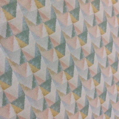 Pano têxtil com padrão geométrico em tons pastel