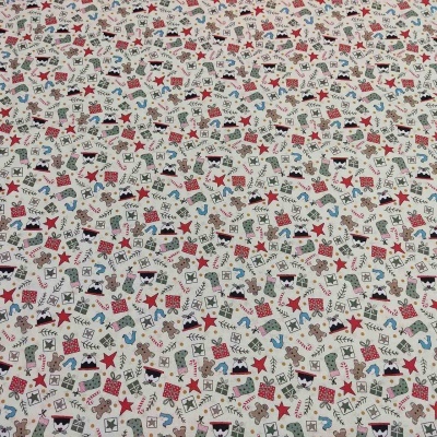 Tecido branco com padrão de desenhos coloridos variados e texto 'SURPRISE'