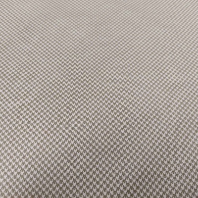 Tecido bege e branco com padrão pied-de-poule pequeno