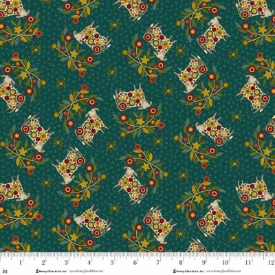 Pano verde com padrão de vaquinhas coloridas e ramos floridos