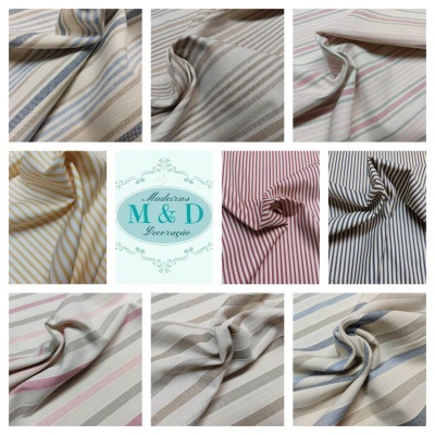 Tecidos às riscas em várias cores com textura suave e logo central Madeiras M & D Decoração