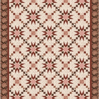 Colcha de retalhos rosa, castanha e bege com padrão geométrico e borda floral.