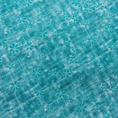tecido azul turquesa com padrão de flores pequenas