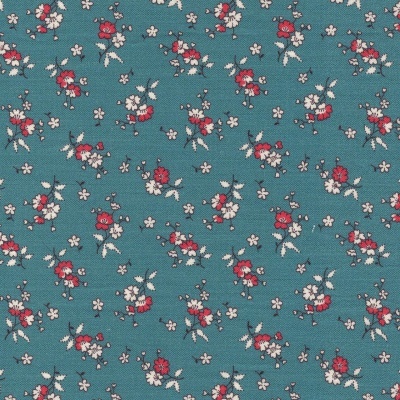 Tecido azul com padrão floral vermelho, branco e bege