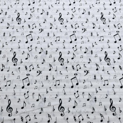 Tecido branco com notas musicais pretas.