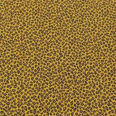 Tecido amarelo com padrão animal print castanho.